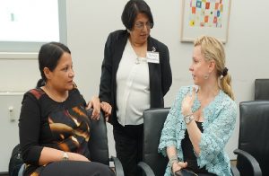 BANDANA PURKAYASTHA consulting with WHO Team Leader for Gender, Equity and Human Rights VERONICA MAGAR at right